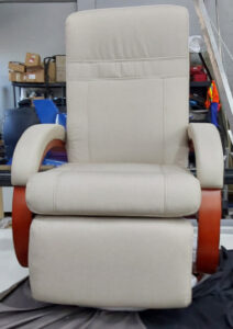 Euro chair recovered in a light greyish tan fabric