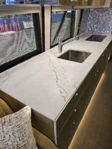 White with gold marble Corian countertop